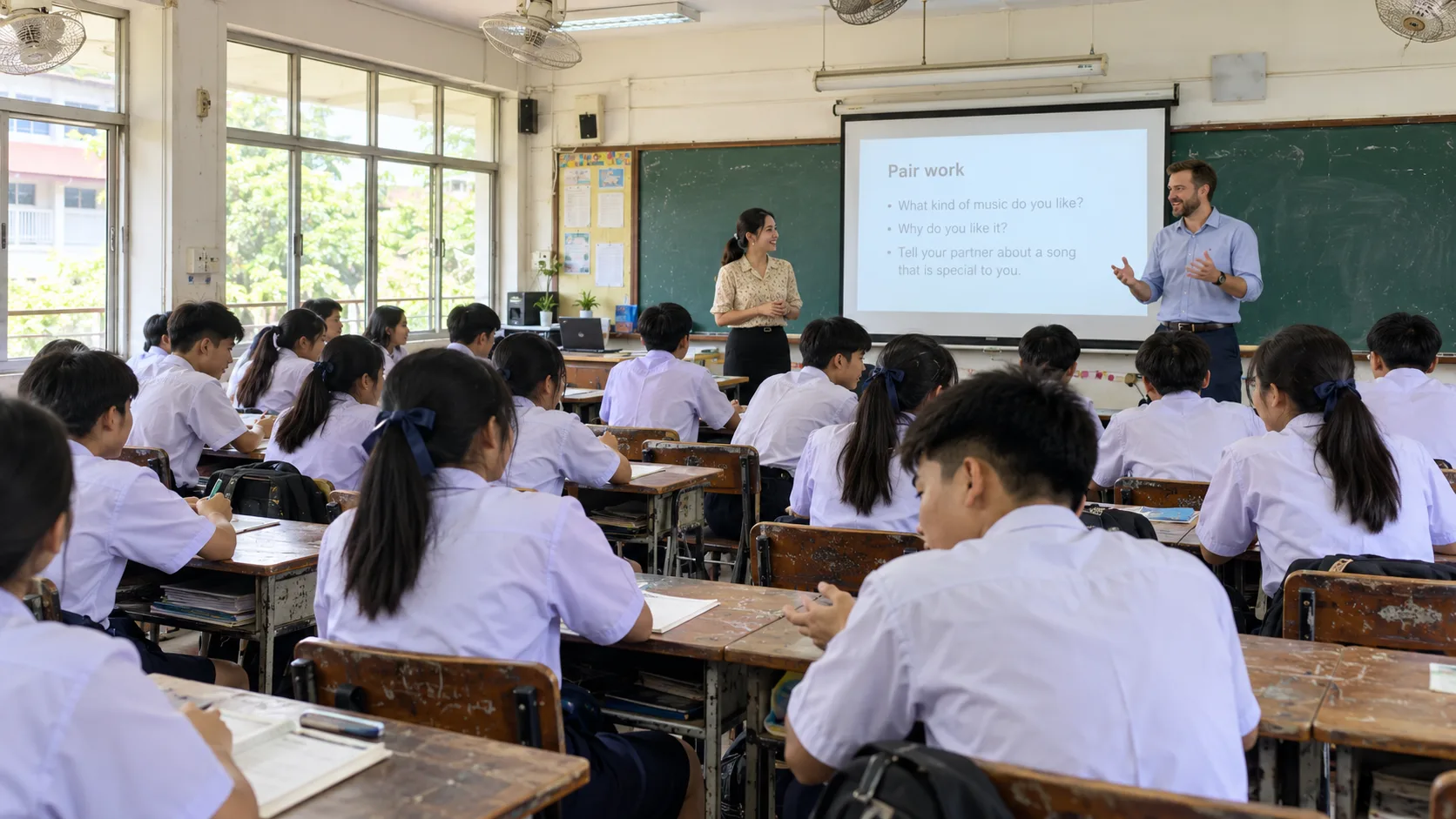 A foreign English teacher and Thai co-teacher lead a pair-work activity in a busy secondary classroom; illustrative AI-generated scene.